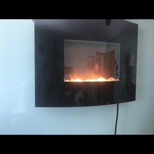 Wall mounted heater with fake flames